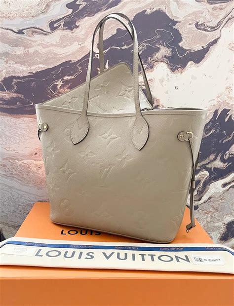 louis vuitton onthego mm monogram empreinte turtledove cream giant bag|louis vuitton monogram.